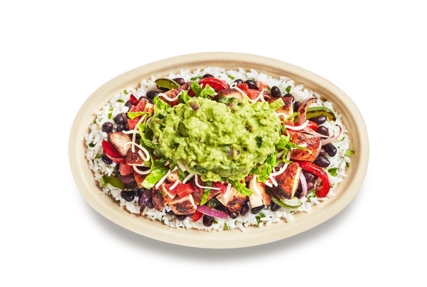 Chipotle burrito bowl with rice, beans, chicken and guacamole